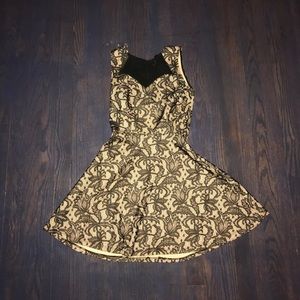 Short beige/black dress.